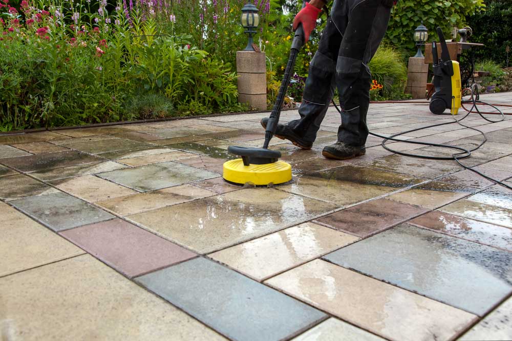 person cleaning tiles floor