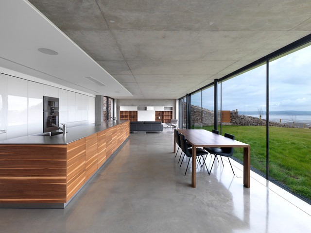 a big hall room with a glass window for a green view outside