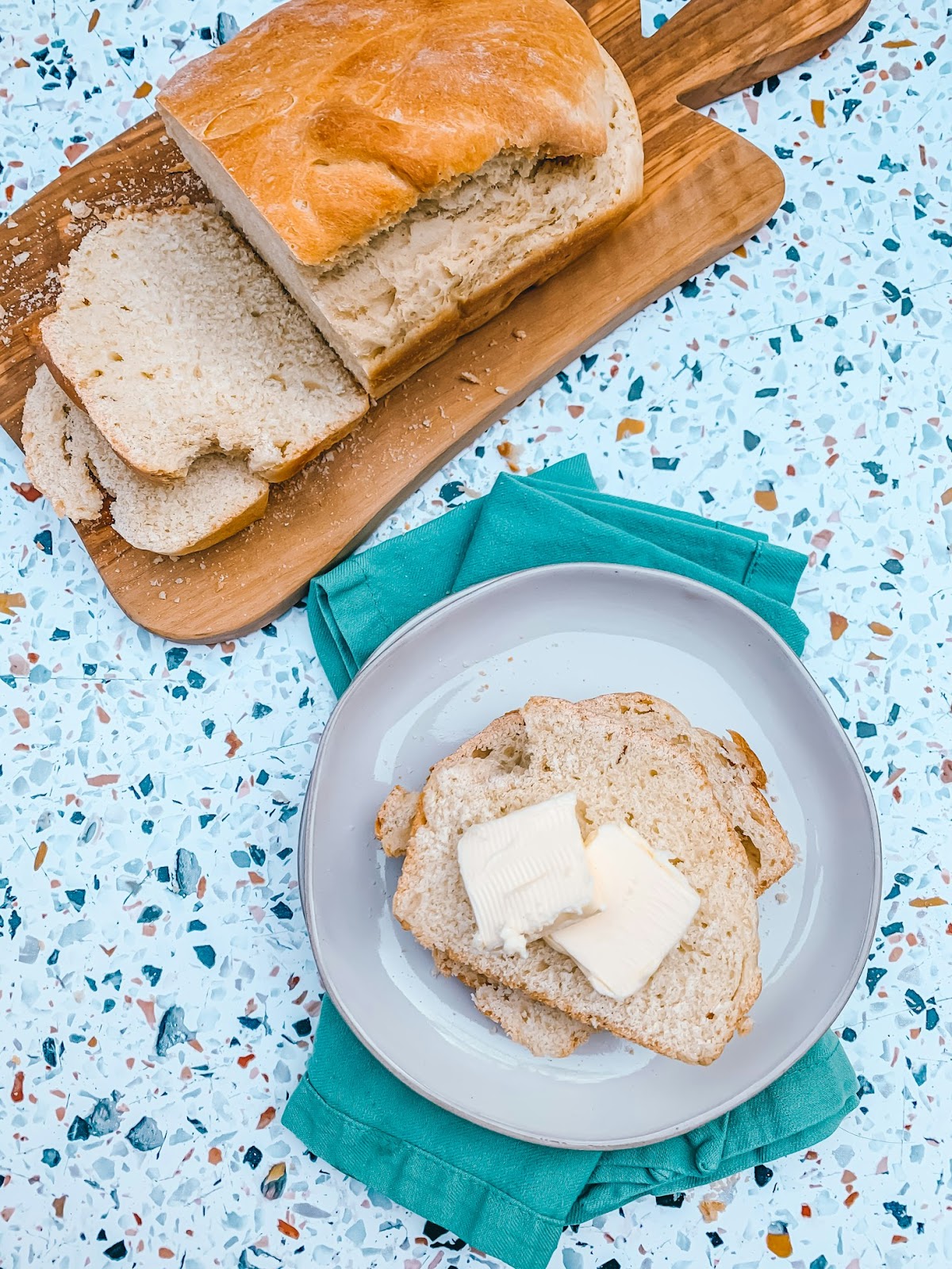 bread on blue and white round plate
