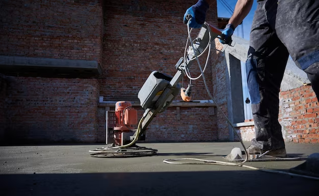 a professional cleaning concrete with concrete cleaner machine