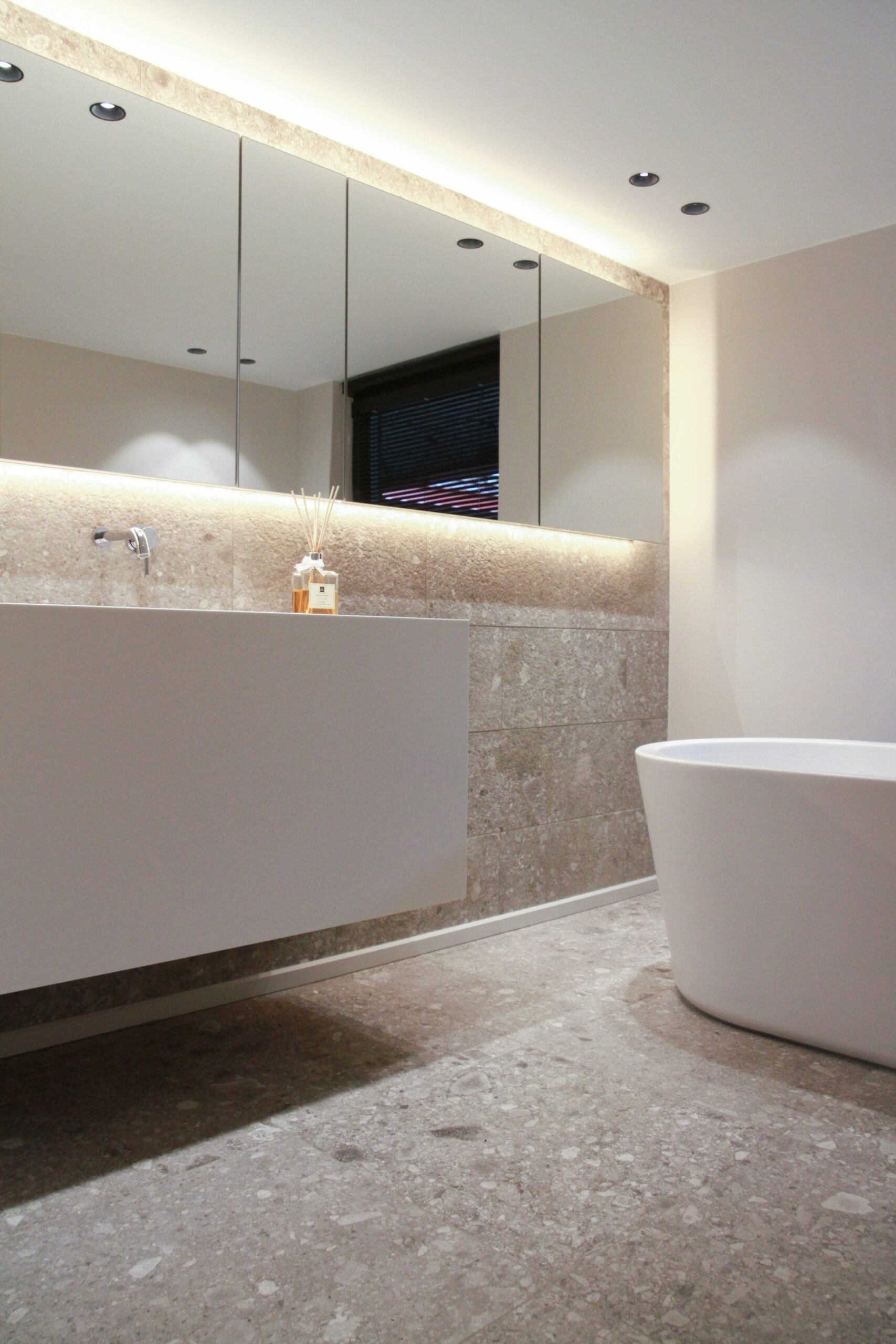 Natural stone floor in bathroom